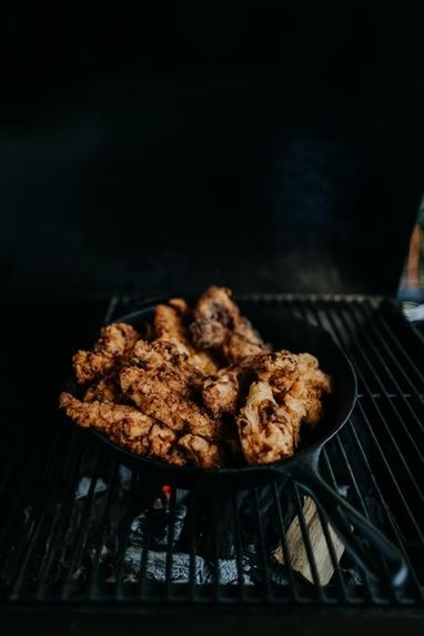 Chicken grilled in a cast iron pan