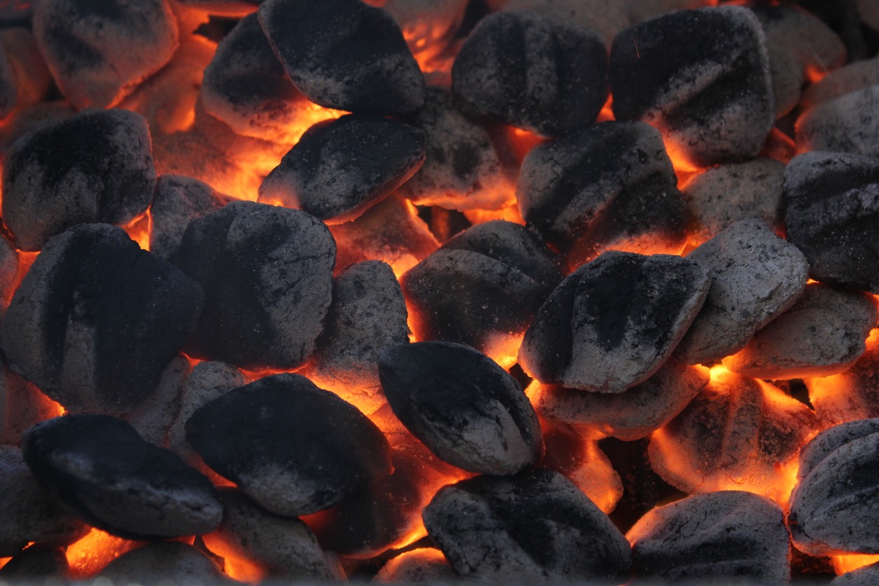 Glowing charcoal briquettes