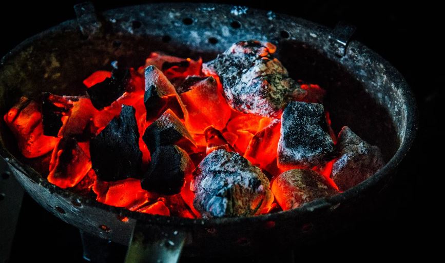 burning charcoal in pan
